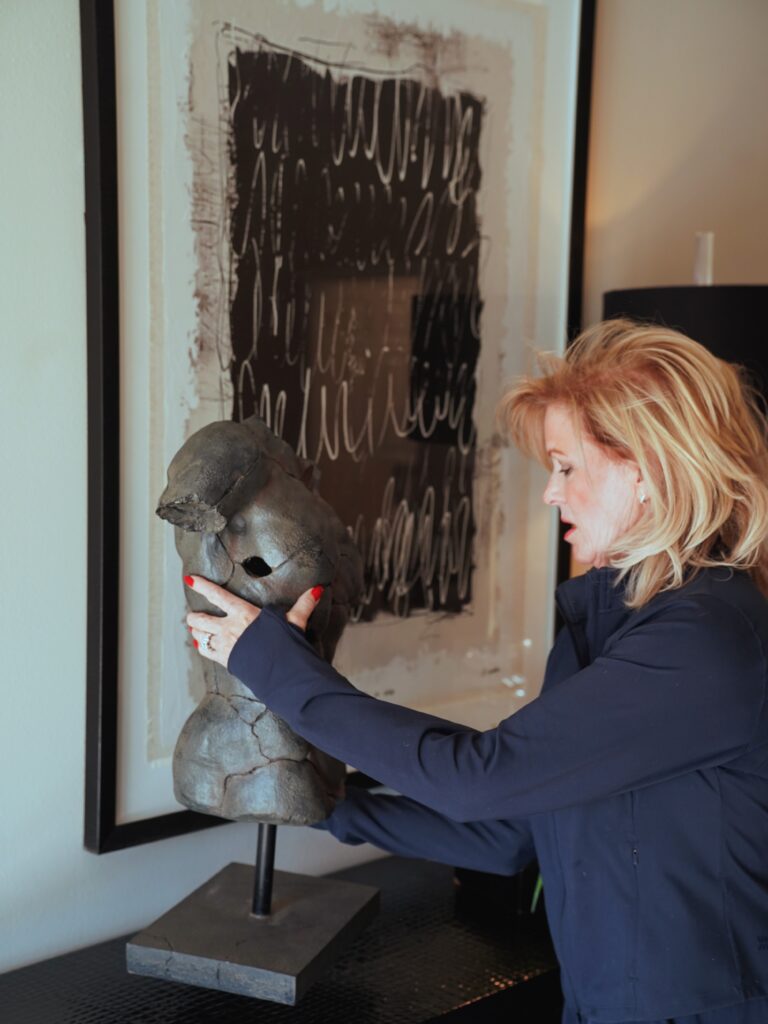 woman staging a sculpture