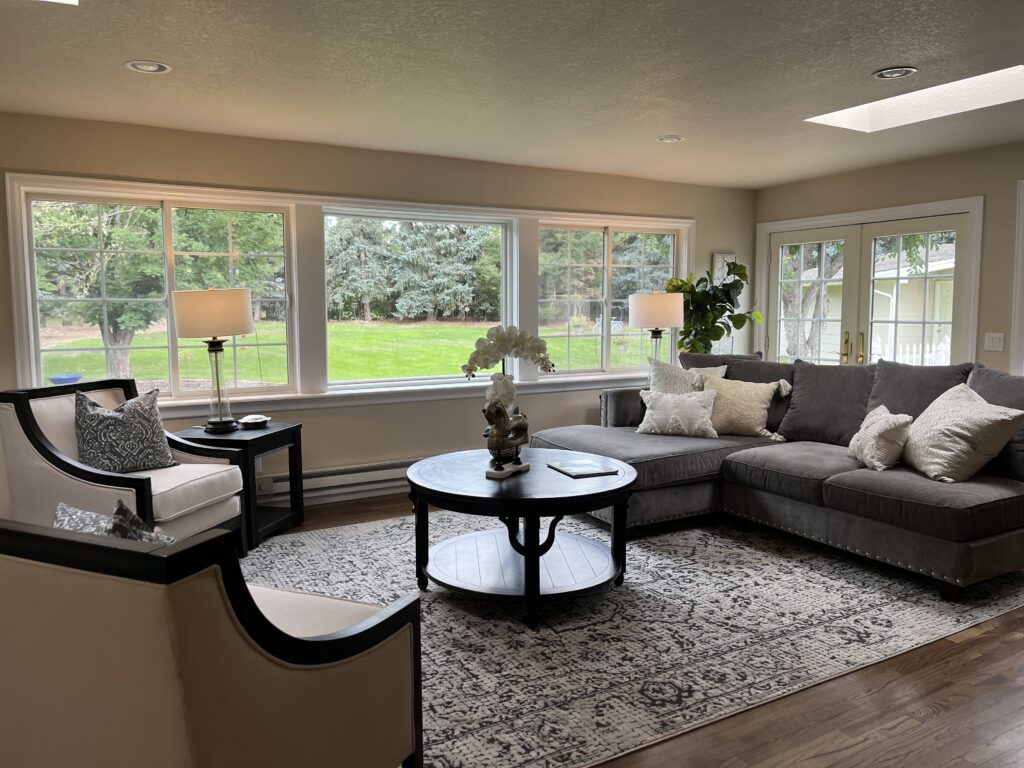 nice living room with green grass out the window. 